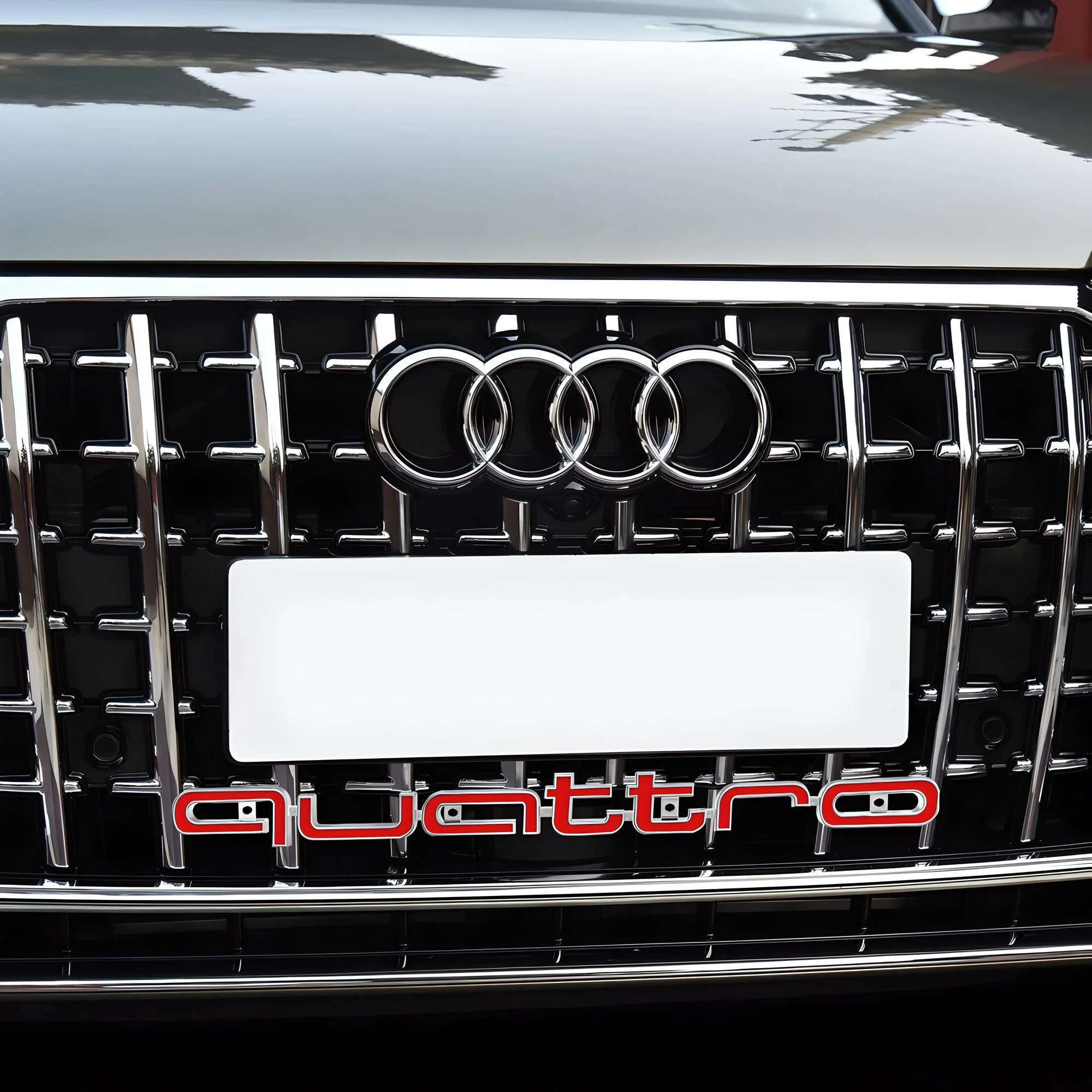 Audi Front Grille Badge | Quattro – high-quality car emblem, wheel cap, steering wheel badge or accessory from CarluxParts